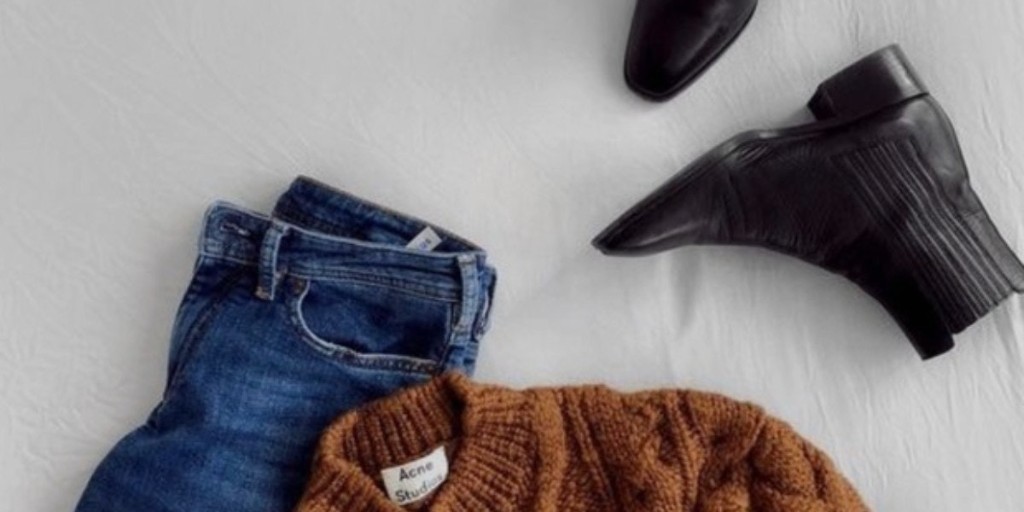 MInimal fashion flat lay | Brown Acne Studios Jumper, blue denim jeans and black boots | Clothing repair tips | Care for your clothes tips