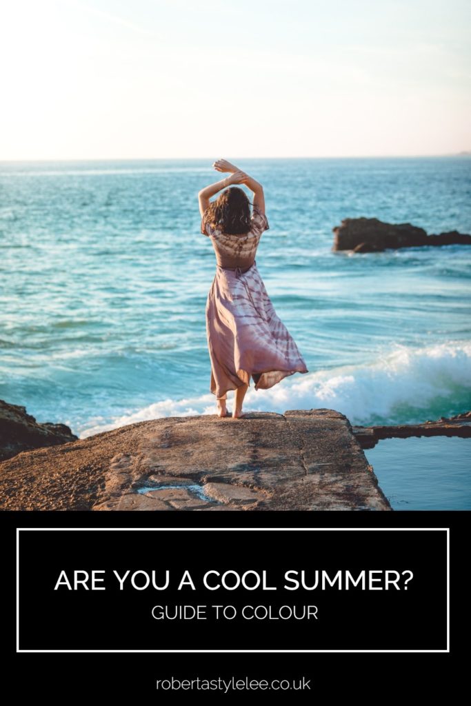 Woman standing on a rock by the sea | Colour Analysis | Are you a True Summer?