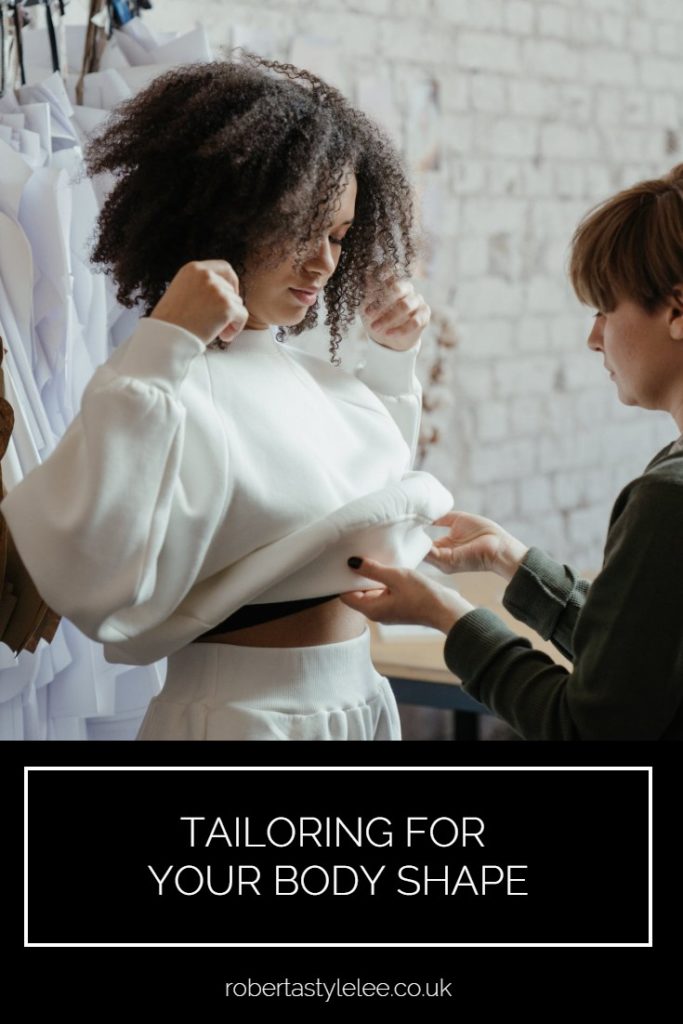 Woman wearing altered white jumper | how to tailor for your body type
