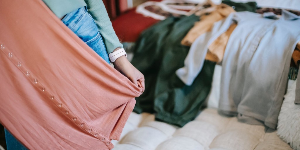 woman shopping for new clothes | why generic fast fashion won’t fit your body type